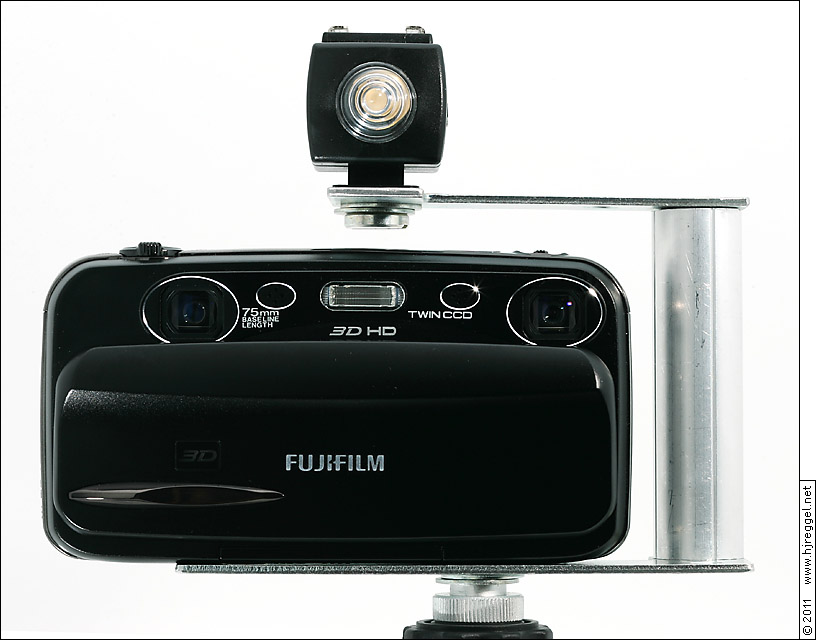 Blitzschiene mit FujiFilm Real 3D W3 und Seagull SYK-5 Auslser